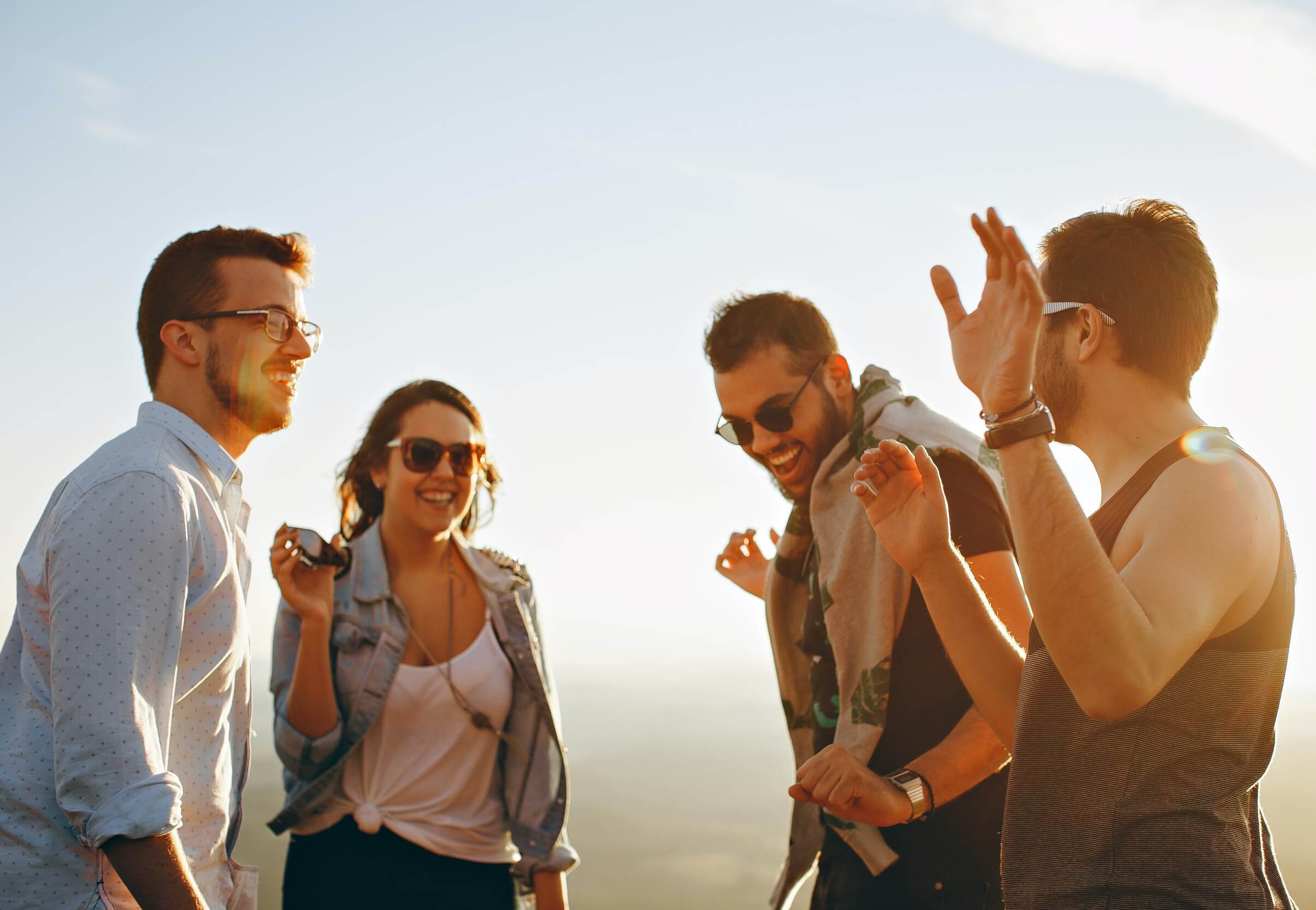 Group of young people dancing or celebrating