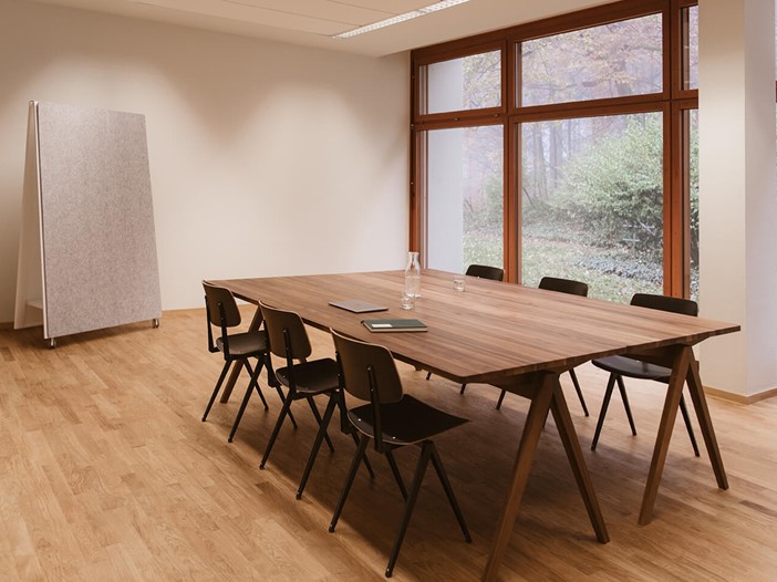 Bright meeting room with wooden floor